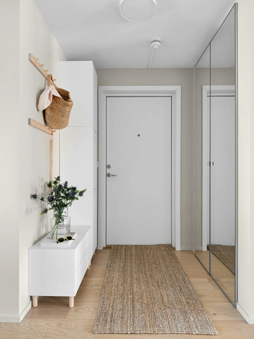 Hallway with timber flooring and painted walls
